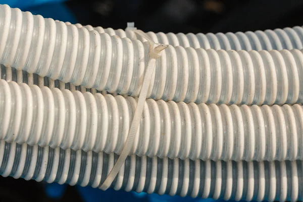 Machines Production Concept Detailed Closeup White Flexible Plastic Hose Pipes — Stock Photo, Image