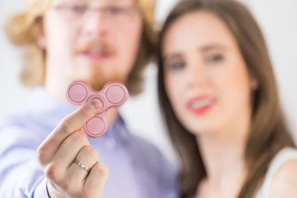 Millennials Couple Being Amazed Simple Toy Man Woman Playing Pink — Stock Photo, Image