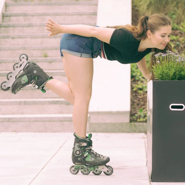 Happy Joyful Young Woman Wearing Roller Skates Riding Town Smelling — Stock Photo, Image