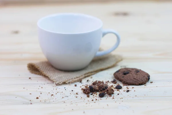 Chocolate Chip Cookies Bite Mark Cup Placed Sack Wooden Table — Stock Photo, Image