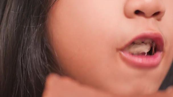 Close Mouth Little Asian Girl Eating Delicious Chocolate Bread — Stock Video