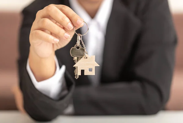 Hand Woman Holding Wooden Model House Key Showing Front Human Royalty Free Stock Photos