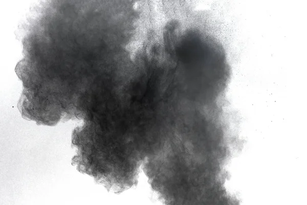Svartkrut Explosion Mot Vit Bakgrund Partiklar Träkol Mulat Vit Bakgrund — Stockfoto