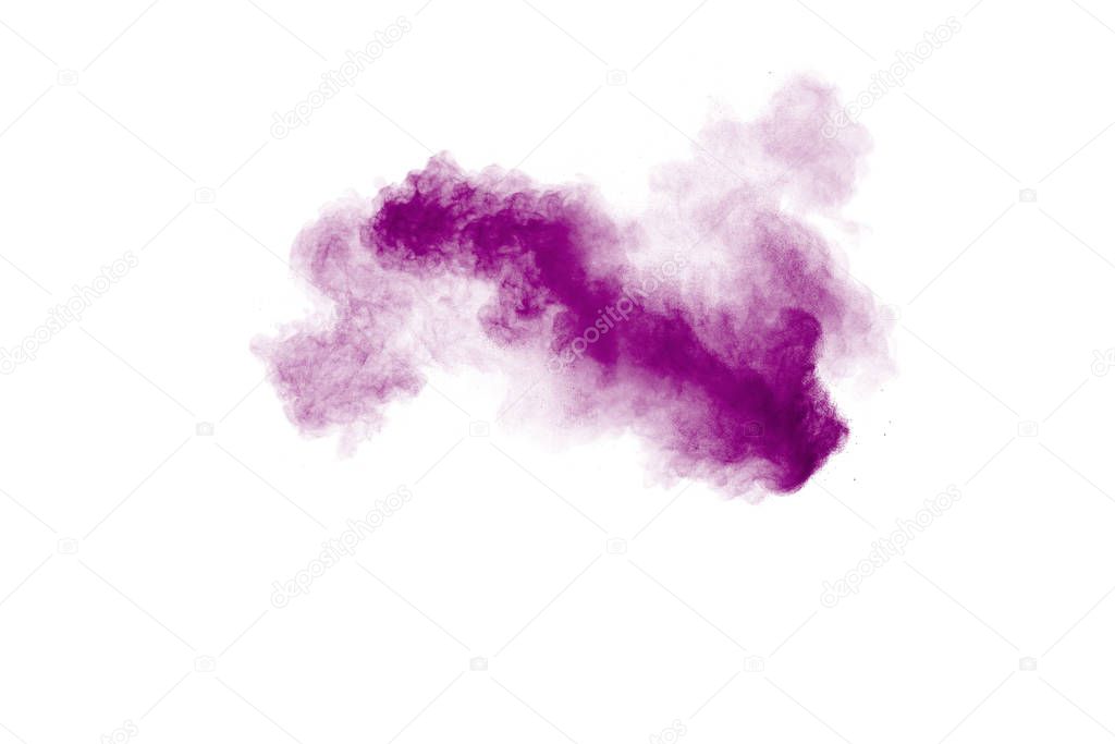 Purple color powder explosion cloud  on white background.Closeup of Purple dust particles splash  on  background.