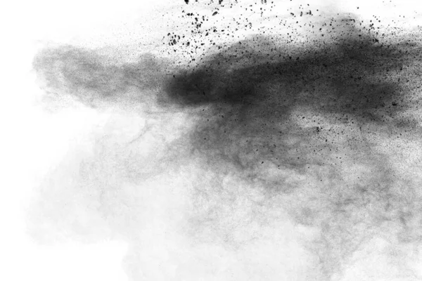 黒い粒子が白い背景に広がっている 黒粉塵バースト — ストック写真