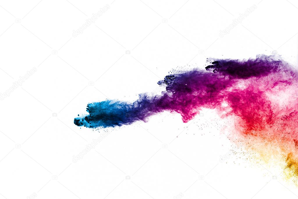 Colorful powder explosion on white background. Abstract pastel color dust particles splash.