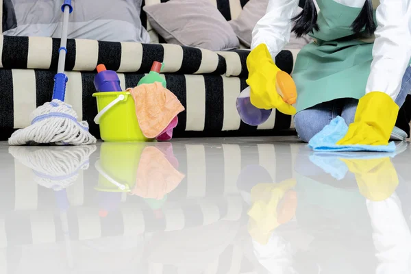 Housekeeper wiping the floor with cloth. — Stock Photo, Image