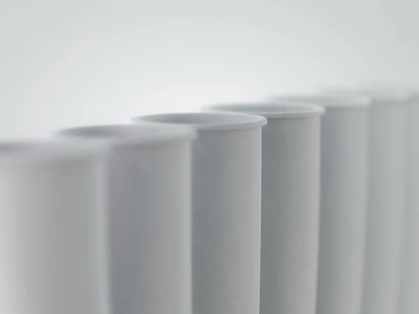 Tubos de ensayo de vidrio blanco. Renderizado 3D — Foto de Stock