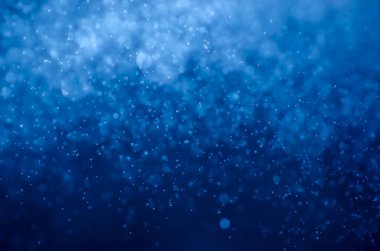 Mavi bokeh soyut arkaplan.