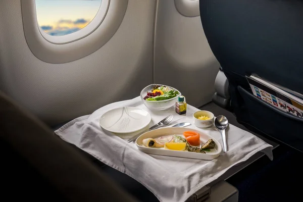 Lunch on board of airplane — Stock Photo, Image