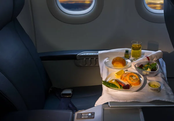 Lunch on board of airplane — Stock Photo, Image