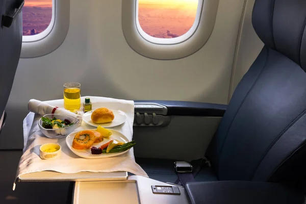 Lunch on board of airplane — Stock Photo, Image