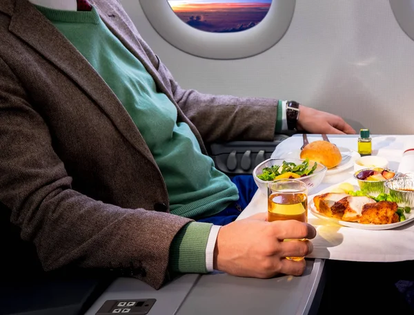 Lunch on board of airplane — Stock Photo, Image
