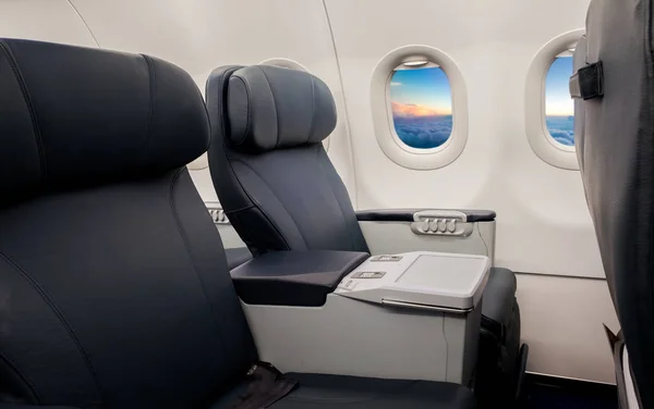 Empty seats and window inside an aircraft