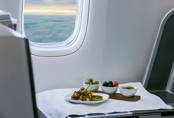 Lunch on board of airplane — Stock Photo, Image