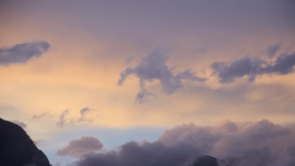 Fast moving clouds in sunset sky — Stock Video