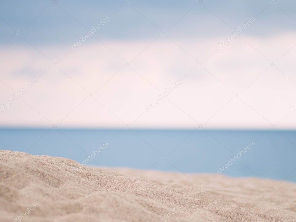 Closeup of sand with sea background