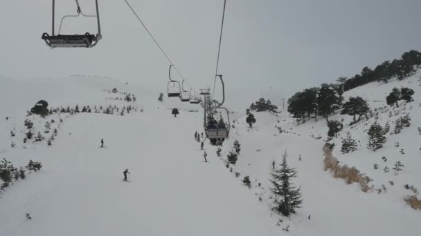 Front view from ski elevator on snow mountain. — Stock Video