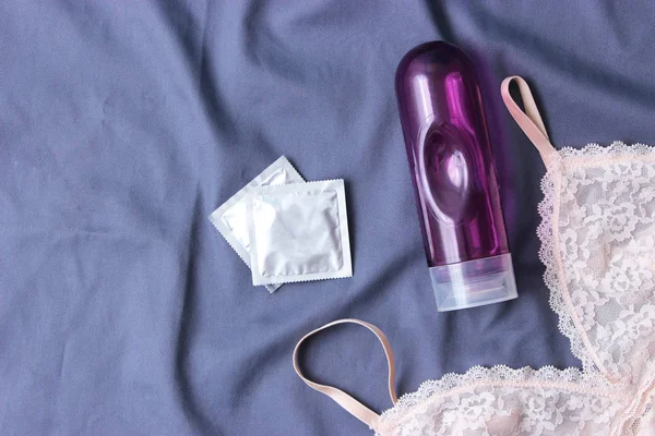 Intimate Lubricant Female Bra Background Sheet Condoms Intimate Gel — Stock Photo, Image
