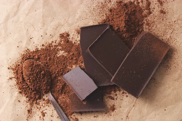 pieces of chocolate and cocoa. black chocolate.
