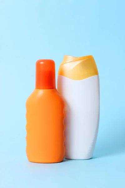sunscreen on a colored background. Cosmetics for safe sunburn. minimalism