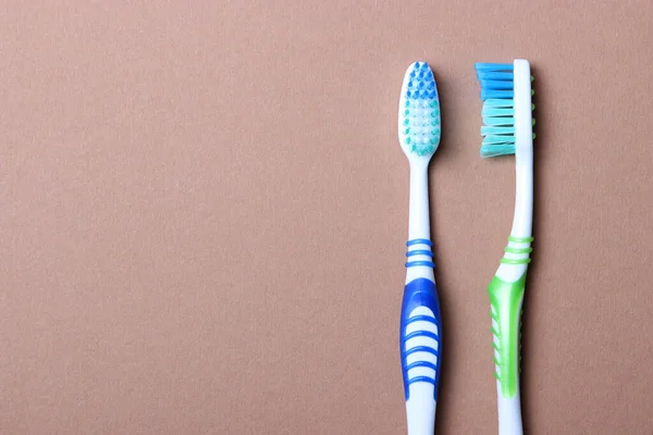 Tandenborstels Een Gekleurde Achtergrond Bovenaanzicht Mondelinge Hygiëne — Stockfoto