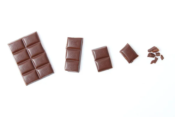 Pedaços Chocolate Isolado Branco — Fotografia de Stock