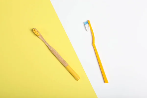 Natural Bamboo Toothbrushes Plastic Colored Background Top View — Stock Photo, Image