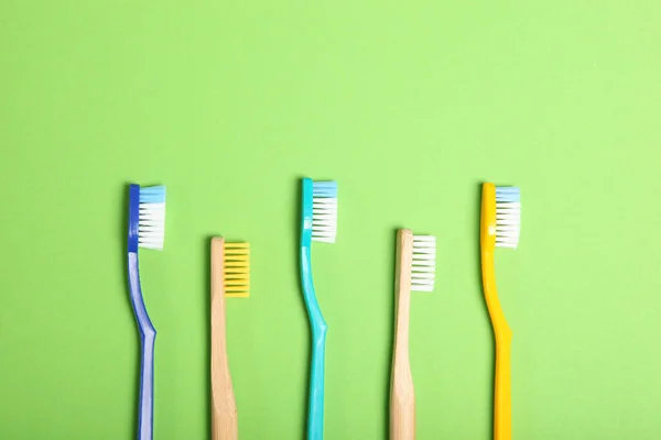 Natural Bamboo Toothbrushes Plastic Colored Background Top View — Stock Photo, Image