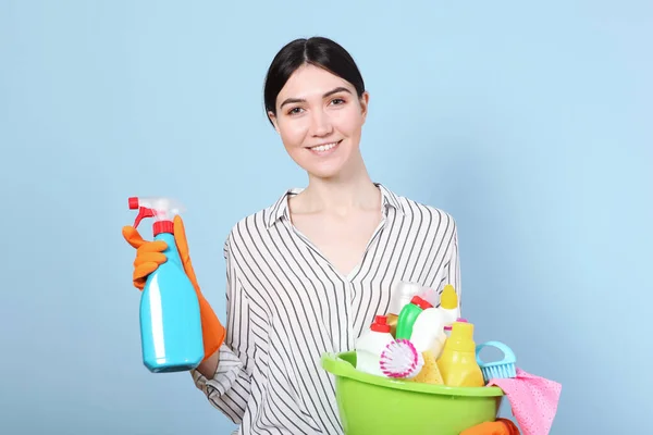 Young Housewife Holds His Hands Cleaning Products Colored Background — Stock Photo, Image
