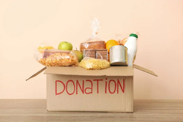 Boxes Donations Necessary Things Table Colored Background Charity Volunteering — Stock Photo, Image