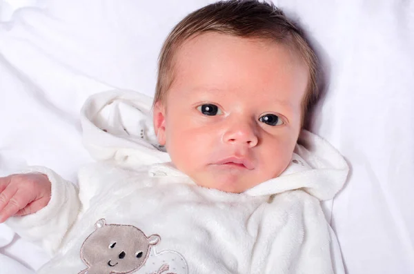 Portrait Cute Baby Boy Looking Camera Newborn Lying Bed White — Stock Photo, Image