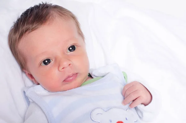 Portrait Cute Baby Boy Looking Away Newborn Lying Bed White — Stock Photo, Image