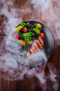 bir domuz biftek duman ve Buhar yükselişi