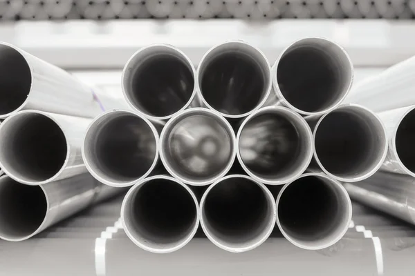 PVC pipes stacked in warehouse. — Stock Photo, Image
