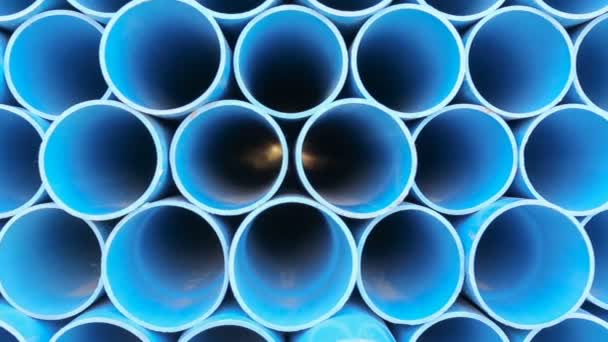 PVC pipes stacked in warehouse. — Stock Video