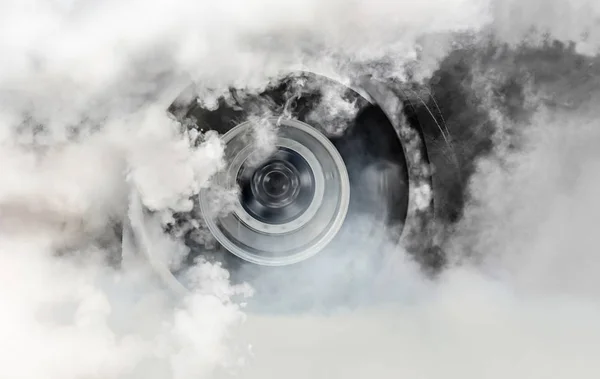 Drag racing car burns rubber off its tires in preparation for the race — Stock Photo, Image