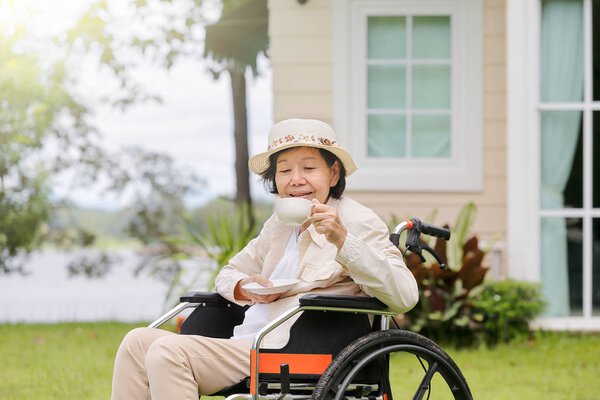 elderly woman relax in backyard
