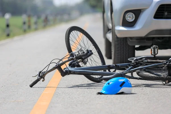 Accident car crash with bicycle on road