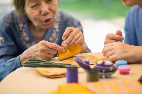 Elderly Woman Caregiver Needle Crafts Occupational Therapy Alzheimer Dementia — Stock Photo, Image
