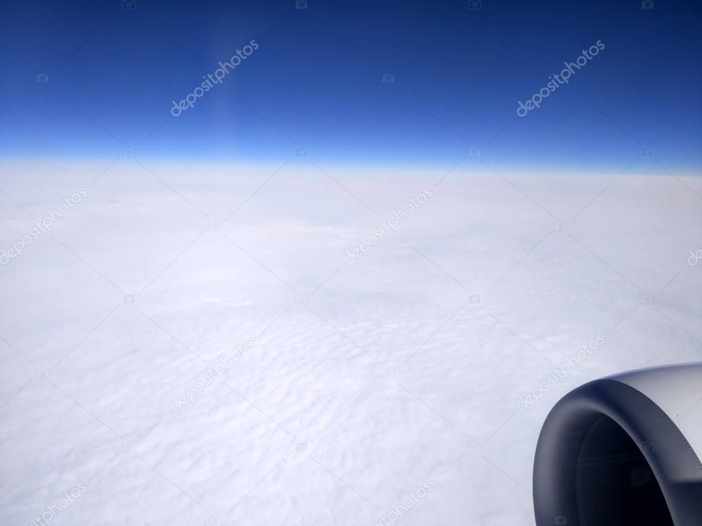 Above Puffy Clouds