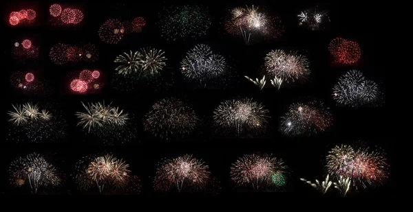 Novos fogos de artifício ano definido no fundo preto — Fotografia de Stock