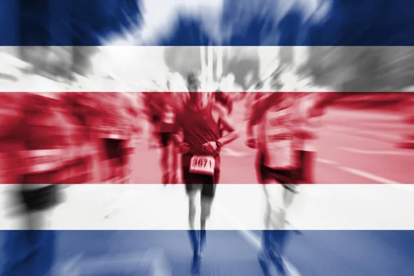 Maratona corredor movimento borrão com misturando bandeira da Costa Rica — Fotografia de Stock