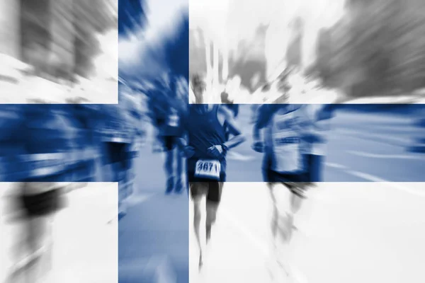 Marathonläufer verschwimmen mit finnischer Flagge — Stockfoto