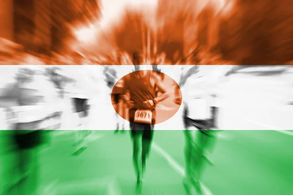 Marathon runner motion blur with blending  Niger flag — Stock Photo, Image