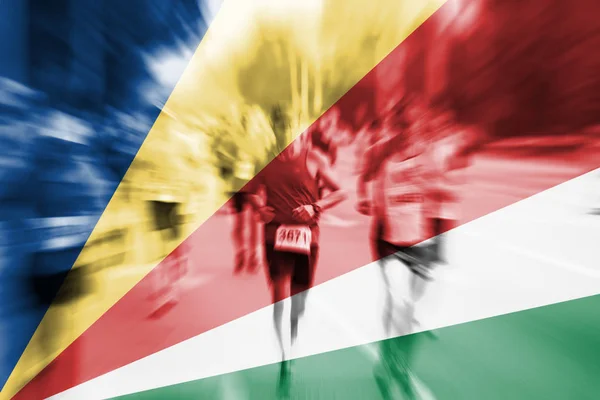 Marathonläufer-Bewegung verschwimmt mit Seychellen-Flagge — Stockfoto