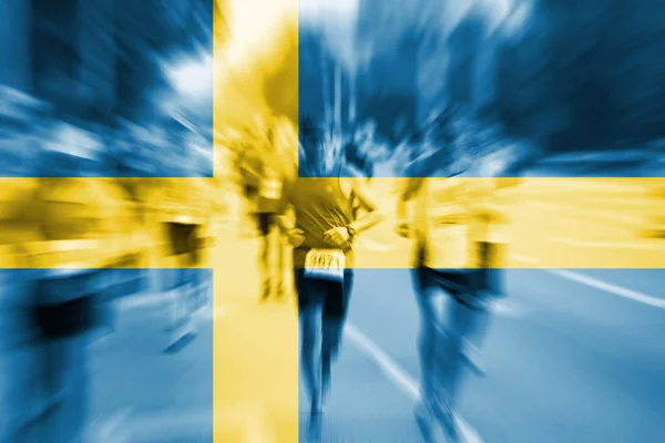 Marathonläufer verschwimmen mit schwedischer Flagge — Stockfoto