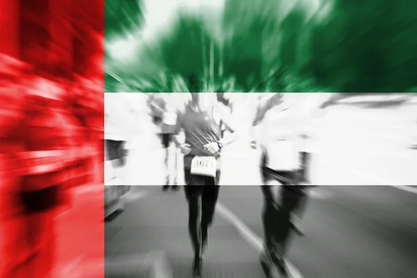 Marathonläufer-Bewegung verschwimmt mit Vermischung vereinigter arabischer Emirate — Stockfoto