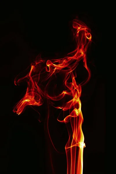 Abstract single fire flame on black background — Stock Photo, Image