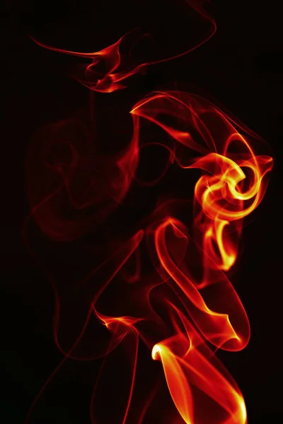 Abstract single fire flame on black background — Stock Photo, Image